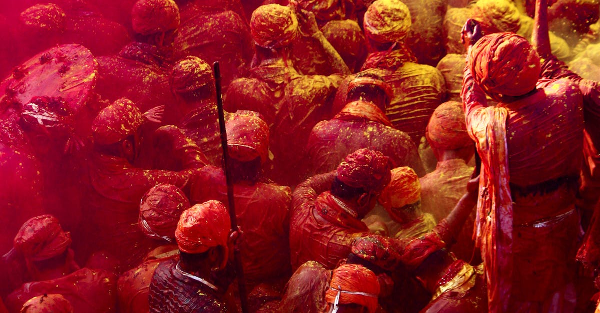 A striking crimson-hued image captures the essence of a bustling crowd, their energy palpable as they converge in a unified mass.