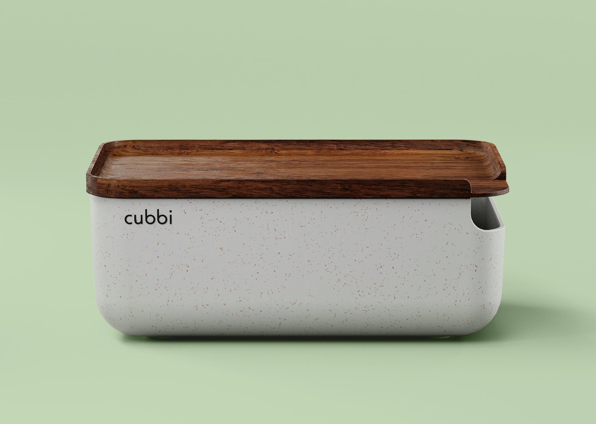 A sleek, gray Cubbi Stash Box with a natural wood lid rests on a vibrant green background.