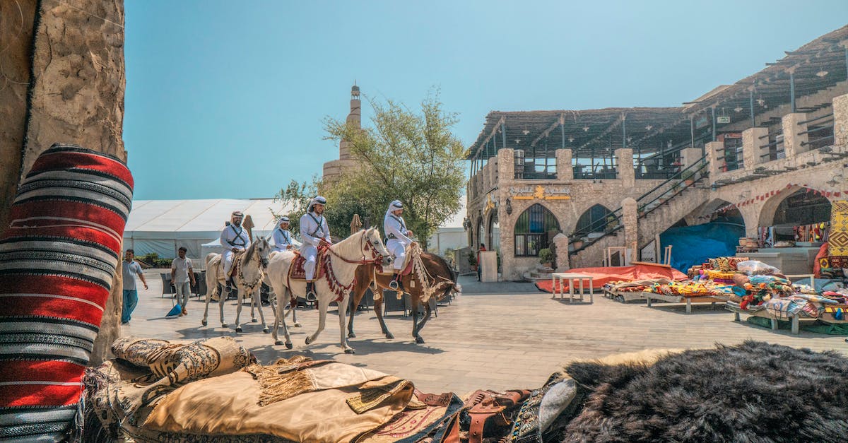 People Riding on Horses.