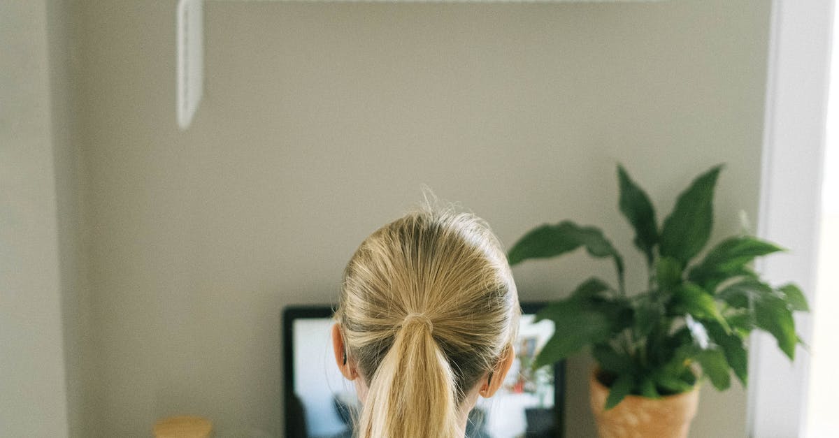 Image of a woman working on her laptop. 