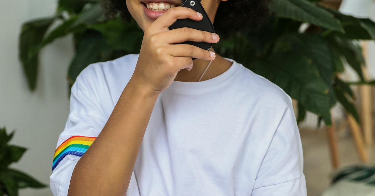 A photo of a man talking to someone over the phone.